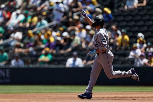 Rockies set club record for runs with 23-9 victory over A's in Las Vegas heat - WHEC.com